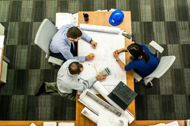 Leadership coaching and team meeting